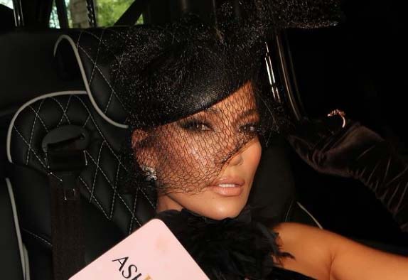 Jennifer Lopez, 53, shows off her highly toned legs in a purple mini-dress